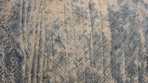 Obraz na płótnie Close up of rough dark grey stone texture with natural weathered surface pattern