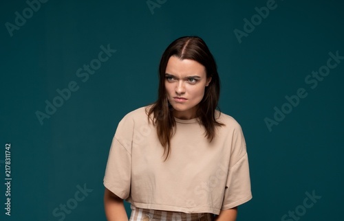 Quadro su tela Woman frowning with frustration, expressing annoyance and displeasure, feeling u