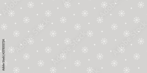 White snowflakes seamless pattern vector illustration on light gray background. Minimalist winter snow ornament for christmas wrapping paper, textile, fabric print