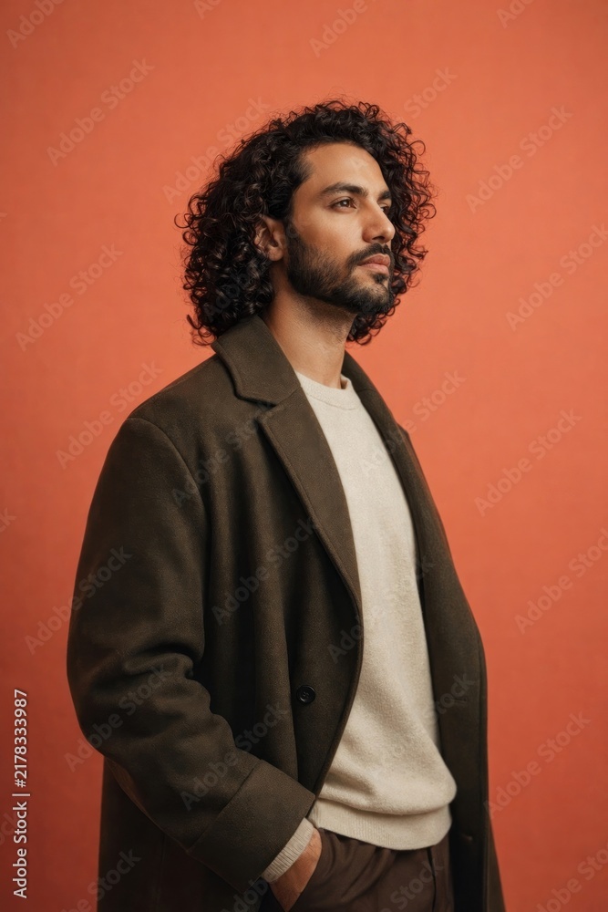 Obraz premium Stylish man with curly hair.
