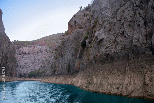 Scenic waterway through Green Canyon, Turkey, with towering limestone cliffs