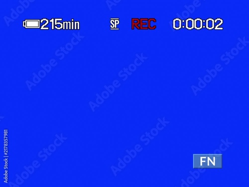 Retro VHS camcorder interface with timecode on a blue background. Recording video with an old camera.