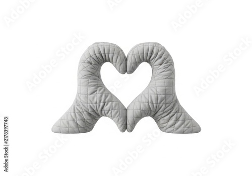 Grey quilted fabric hands forming a heart shape