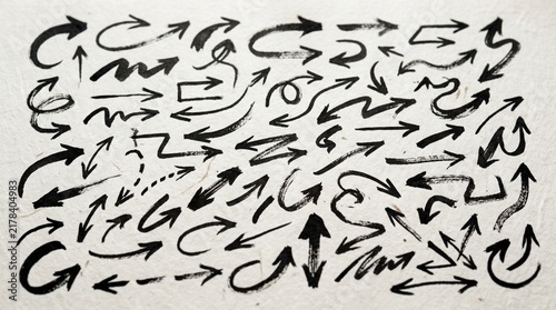 Hand Drawn Arrow Collection: Grunge & Sketch Style on Textured Paper