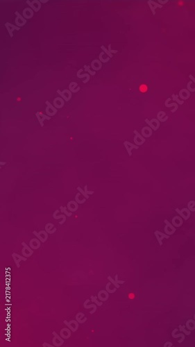 Animation of falling glowing red light spots on dark red smoke background