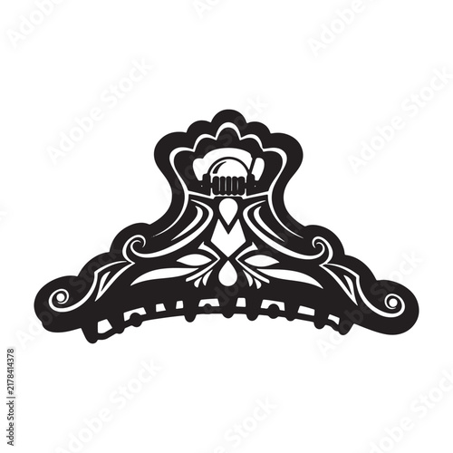 Ornate black and white of a decorative hair claw clip with floral patterns, isolated on a white background, for beauty use
