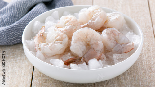 transparent peeled jumbo shrimp on a white background