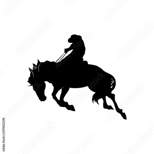 Black Silhouette of a Cowboy Riding a Bucking horse
