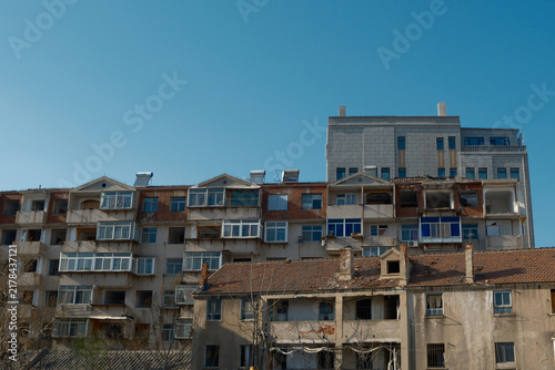 Принти на полотні Abandoned Older Houses with Deteriorated Architecture and Exposed Interiors