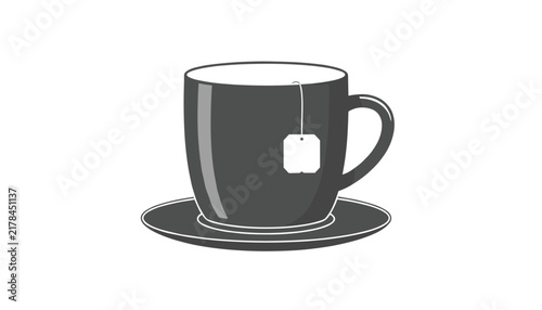 Simple dark grey teacup with a white tea bag label hanging out, resting on a matching saucer cup coaster.
