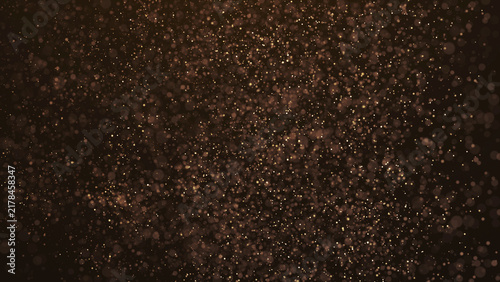 Abstract background of gold particles. Gold shiny background. gold dust and beautiful bokeh on a dark background