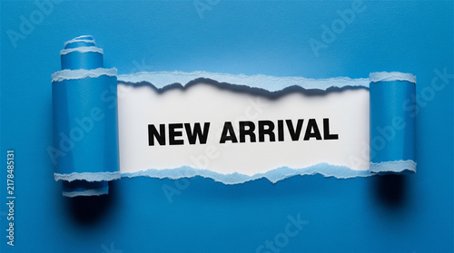 New Arrival text on white background, blue torn paper reveal, creative marketing announcement for retail and product launches