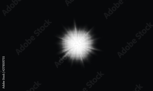 Bright glowing white starburst light flare effect on black background