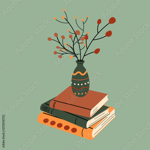 A vase with autumn berries sitting on a stack of books against a sage green background. Perfect for cozy hygge and fall decor designs. Autumn vibes, reading theme. 