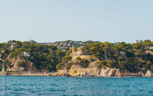 Scenic view of Castell d'en Plaja on the rocky coast of Lloret de Mar, Spain