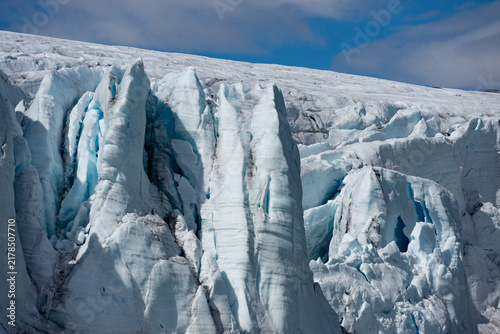 Fotografie Close up details of deep blue crevasse ice structure in a glacier