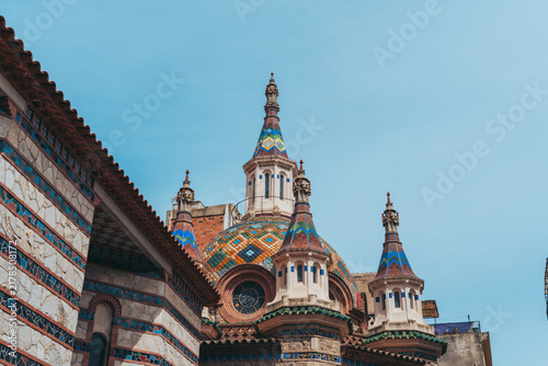 Colorful Mosaic Domes of Sant Romà Church in Lloret de Mar, Spain