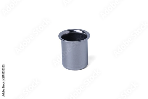 Fotografía Small cylindrical metal cup part of a garlic press isolated on white