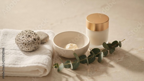 Skincare Products with Volcanic Stone and Eucalyptus Leaves, a Natural Beauty Concept