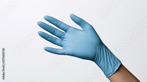 Hand in blue protective nitrile glove isolated on white background