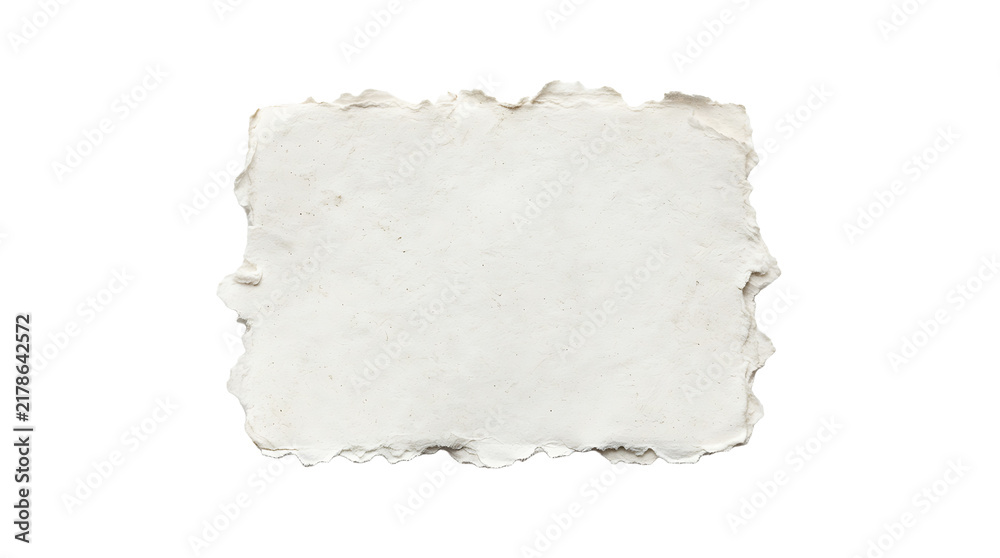 Fototapeta premium A rough torn piece of white paper with ragged edges isolated for design use and scrapbooking projects on plain surface