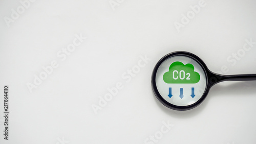 Obraz na płótnie Carbon Dioxide CO2 Emission Reduction and Climate Change Concept with Magnifying