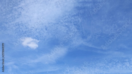 Canvas Print Minimalist blue sky background with light clouds