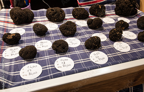 Bild auf Leinwand Black truffles at the Truffle Exhibition in Alba, Autumn gourmet cuisine of Piedmont, Northern Italy, France, Spain