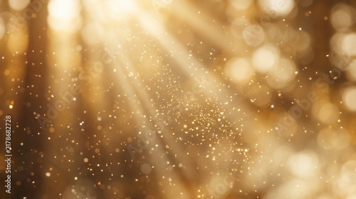 Beautiful glowing texture with abstract blurred golden background and flying dust particles