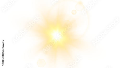 Glowing sun flare starburst with warm orange and yellow light rays and lens glow effects isolated on transparent background.