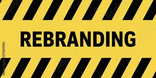 Yellow and black hazard warning stripe background with bold rebranding text