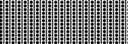 Polkadot seamless pattern with white dots on black background, classic simple round polka texture for wallpaper, fabric and wrapping paper