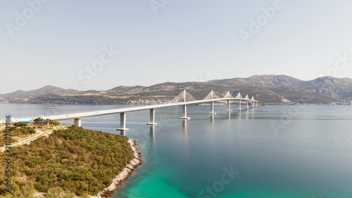 An aerial view of the impressive Peljesac Bridge, connecting mainland Croatia with the Peljesac Peninsula across the Adriatic Sea.