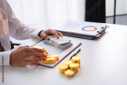 Konstfotografi Businessman investing in gold to diversify portfolios hedge against inflation and currency depreciation