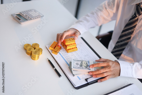 Konstfotografi Businessman investing in gold to diversify portfolios hedge against inflation and currency depreciation