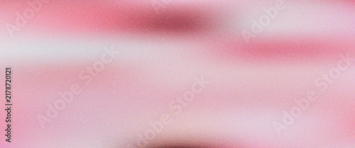 Abstract soft blurred pink gradient background with moody lighting and grain texture