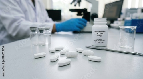 Scientist Examines Medication In Pharmaceutical Research Laboratory Setting