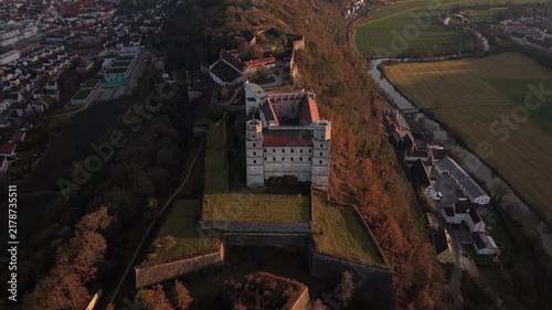 Drone shot of Willibaldsburg Castle overlooking Eichstaett, Bavaria, Germany. Preserved medieval hilltop fortress with observation points, stone towers, museums, and panoramic valley scenery.