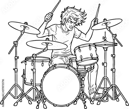 Фотография Energetic male drummer playing a full drum kit with sticks raised, dynamic line