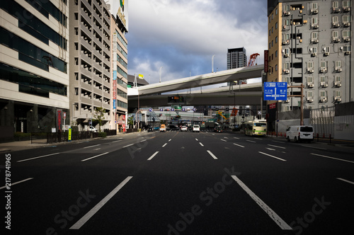 A wide and busy street in Osaka, Japan.