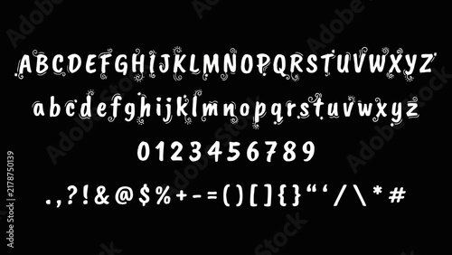 Ornate serif typeface with floral embellishments presents a decorative typographic style font lettering typography embellishment calligraphy vintage classic design