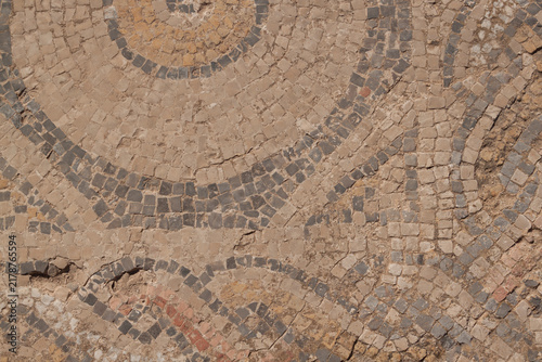A background with a mosaic laid out many centuries ago