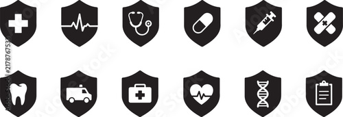 Set of flat black medical shield icons representing healthcare protection symbols isolated on a white background