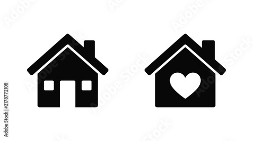 Two black house silhouettes one with a heart shaped window on a white background