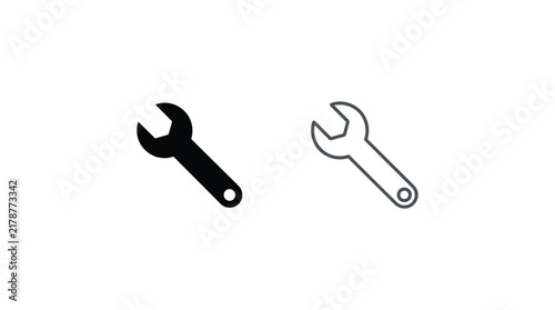 Wrench silhouettes in black and outline styles against a white background