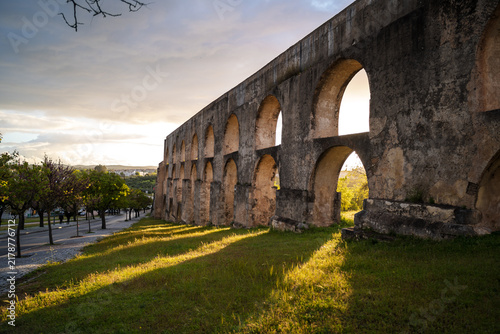 Aqueduct arches in Elvas Portugal at sunset