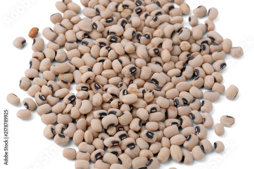 Pile of raw dried black-eyed peas cowpeas isolated on a white background