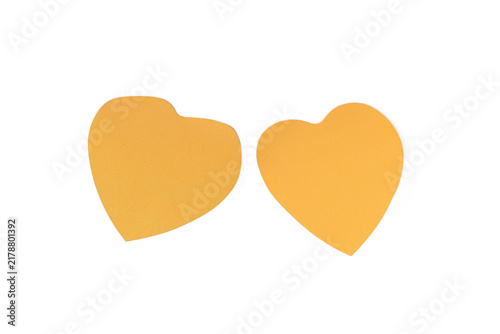 Foto yellow paper heart shapes with patterned fabric on white background