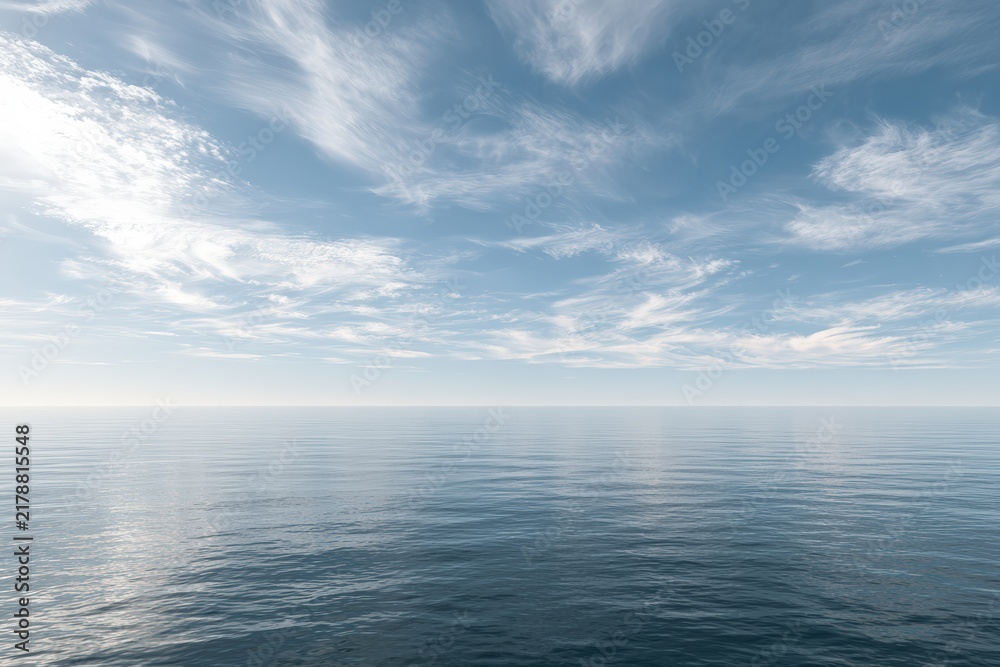 Fototapeta premium Open ocean horizon under wispy clouds on a clear day