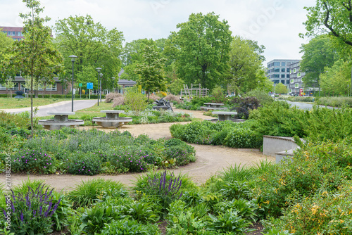 Konstfotografi herb and flower garden with paths and benches, Netherlands